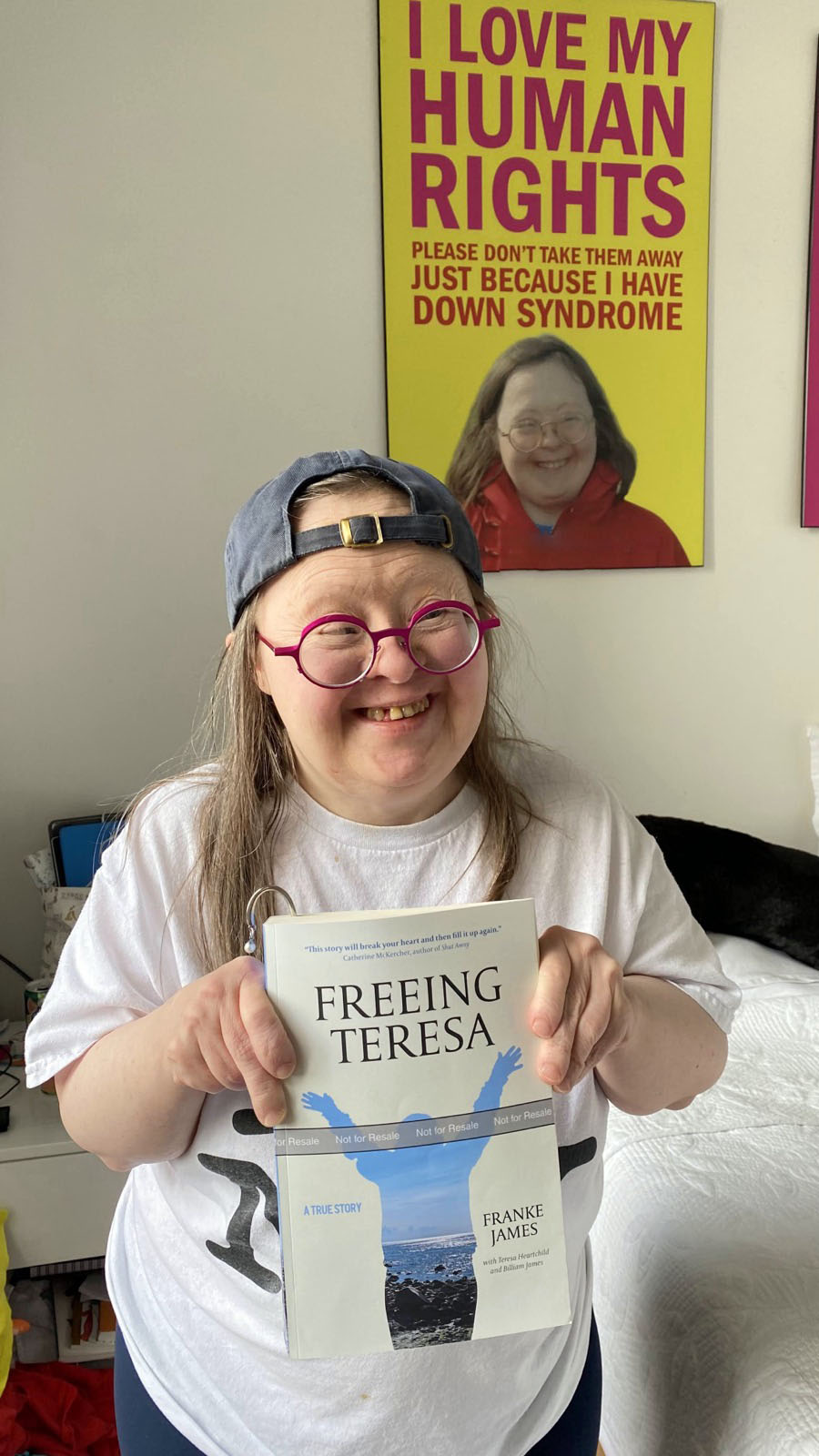 Teresa Heartchild with a copy of Freeing Teresa