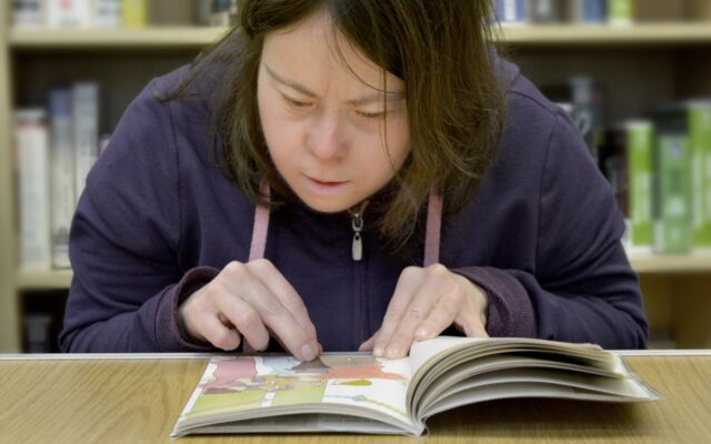 Woman reading picture book