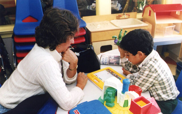 SEN support worker with child