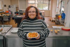 Fallon holding finished fritate figure