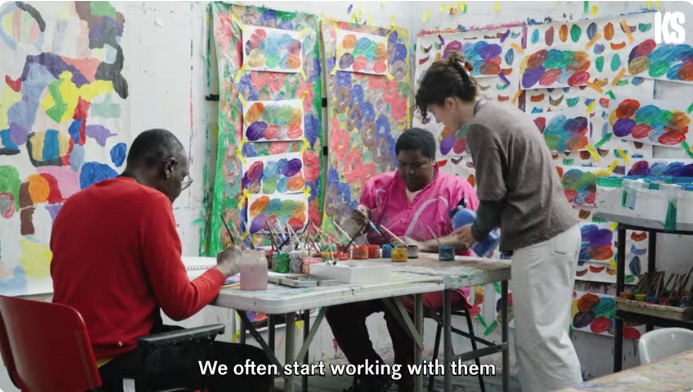 Artist group in workshop