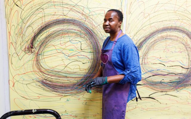 Nnena Kalu with artwork