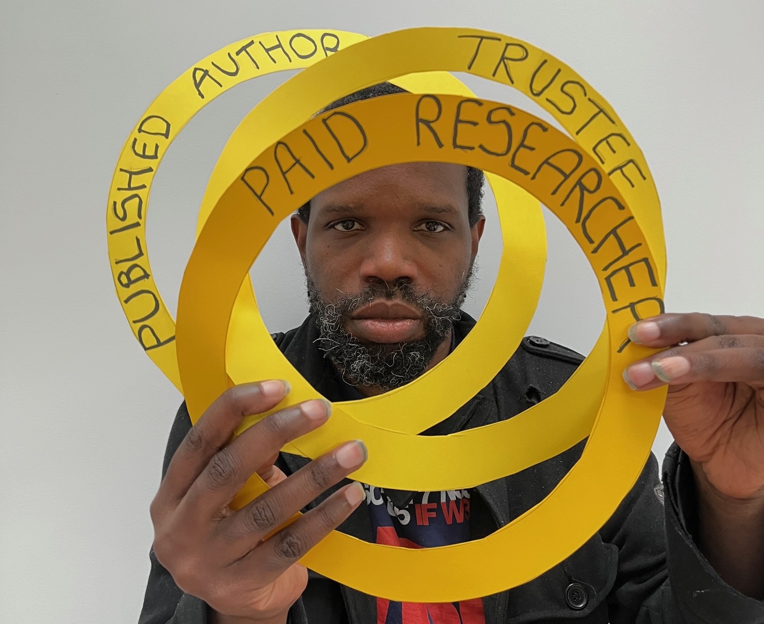 Paul Christian with overlapping paper circles