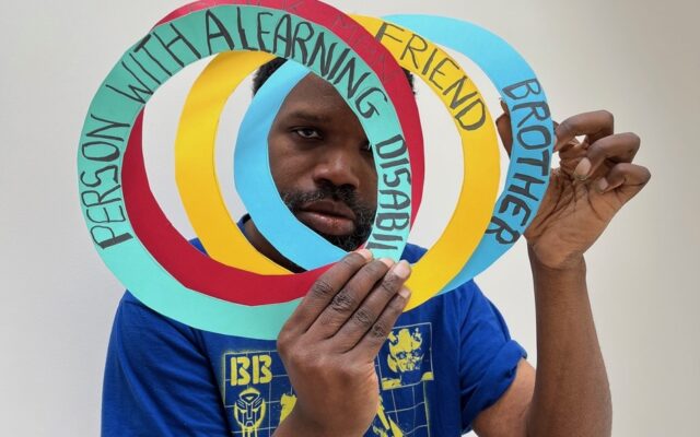 Paul Christian with overlapping paper circles