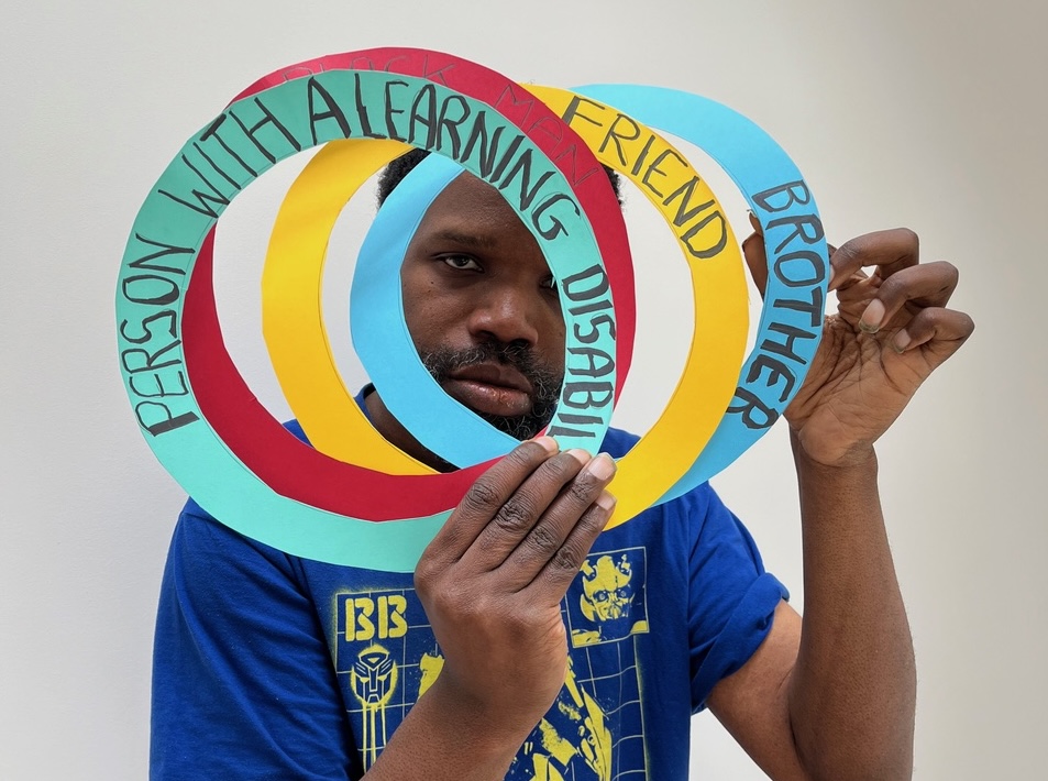 Paul Christian with overlapping paper circles